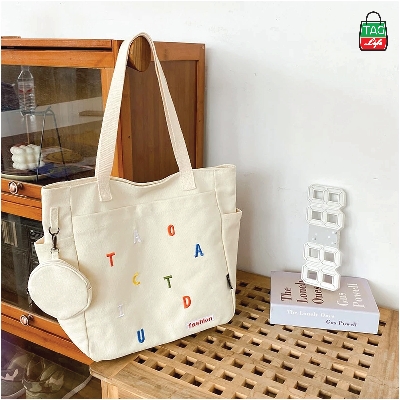 Picture of TAG Lifestyle Exclusive Design embroidery Canvas Tote Bag, Fashionable Top Handle Off White Color With 4 Outside Pockets Trendy Fashionable Tote Bag for University, College Students Girls And Women