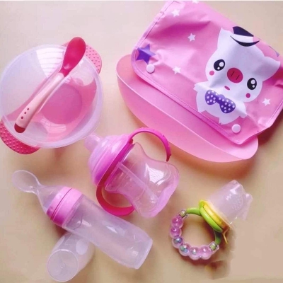 Picture of 6-piece baby feeding set with essential accessories. Includes a sucker bowl set,mam Pot, Slicon spoon Fider,Friut Pacifer& Bibs