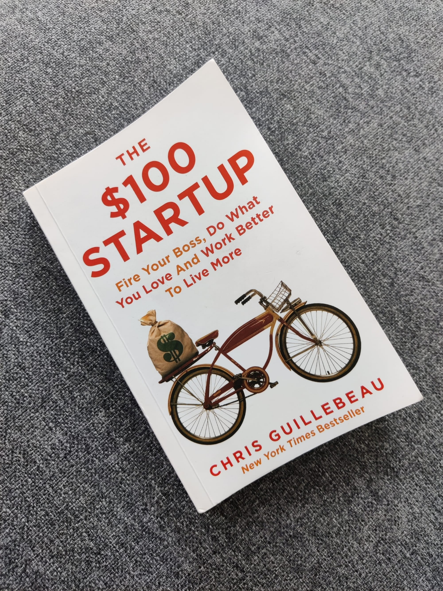 Picture of The $100 Startup: Reinvent the Way You Make a Living, Do What You Love, and Create a New Future by Chris Guillebeau - Yellow - Paperback