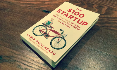 Picture of The $100 Startup: Reinvent the Way You Make a Living, Do What You Love, and Create a New Future by Chris Guillebeau - Yellow - Paperback