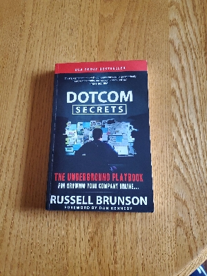Picture of Dotcom Secrets: The Underground Playbook for Growing Your Company Online with Sales Funnels by Russell Brunson - Premium - Paperback