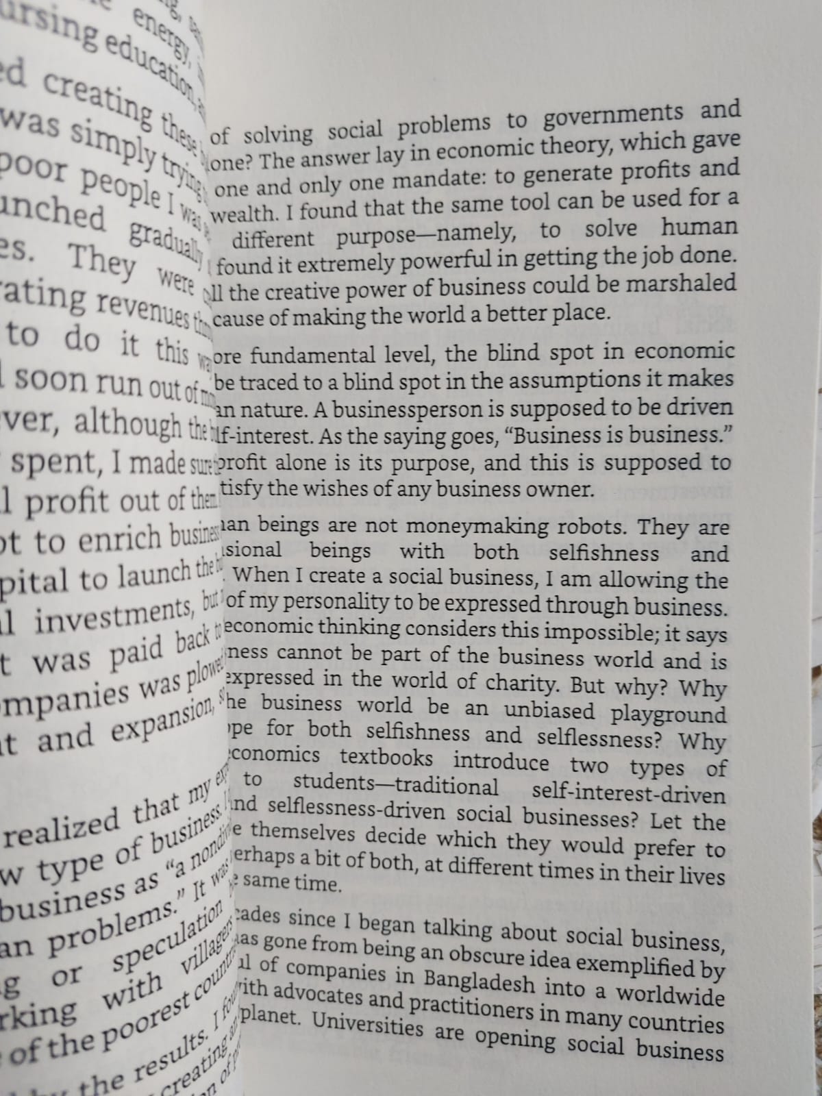Picture of A World of Three Zeros: The New Economics of Zero Poverty, Zero Unemployment, and Zero Net Carbon Emissions by Muhammad Yunus
