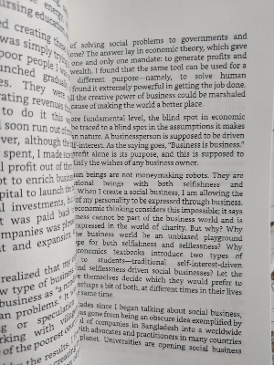 Picture of A World of Three Zeros: The New Economics of Zero Poverty, Zero Unemployment, and Zero Net Carbon Emissions by Muhammad Yunus