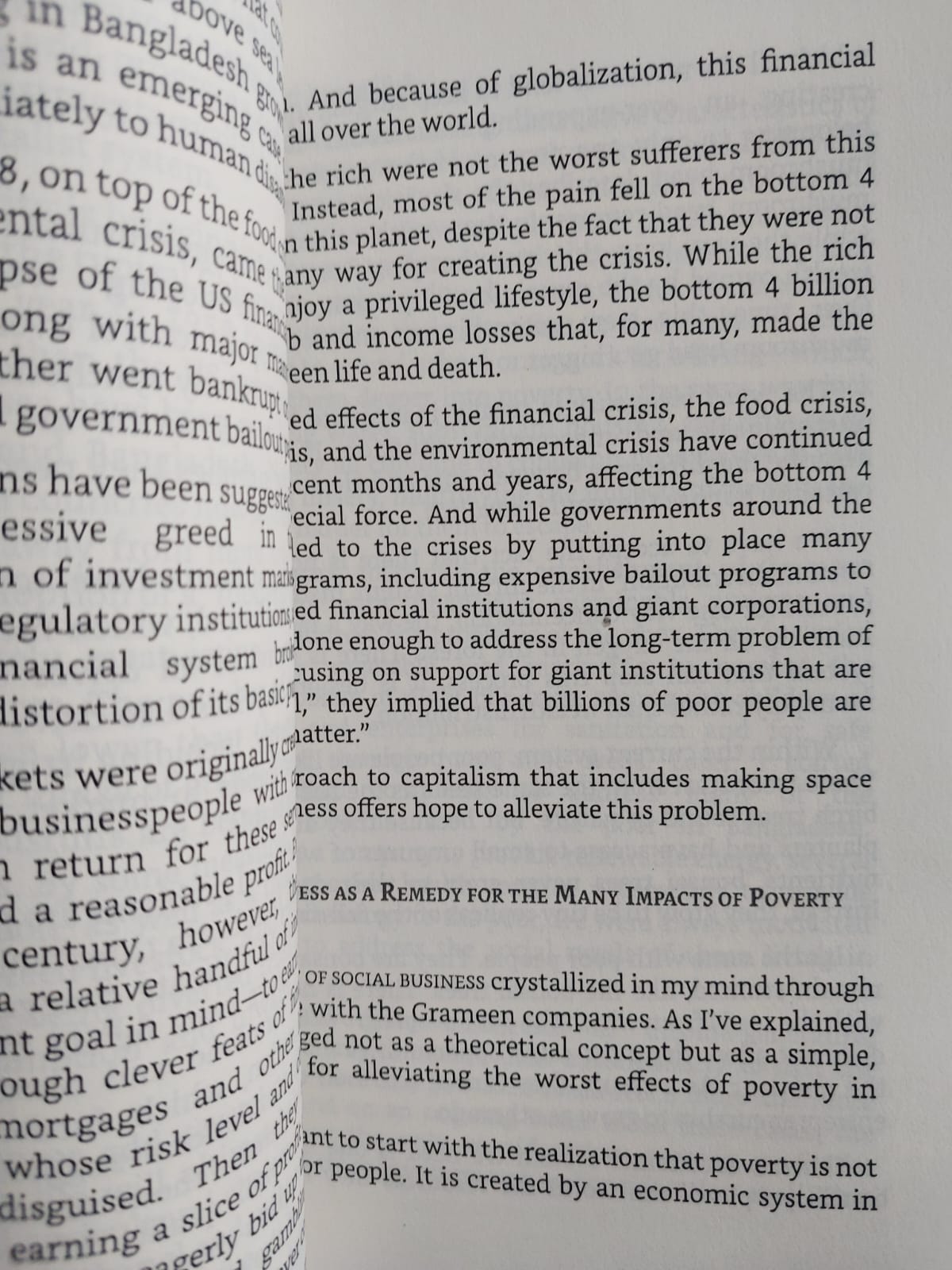 Picture of A World of Three Zeros: The New Economics of Zero Poverty, Zero Unemployment, and Zero Net Carbon Emissions by Muhammad Yunus