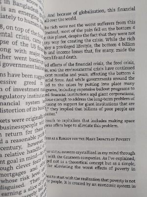 Picture of A World of Three Zeros: The New Economics of Zero Poverty, Zero Unemployment, and Zero Net Carbon Emissions by Muhammad Yunus