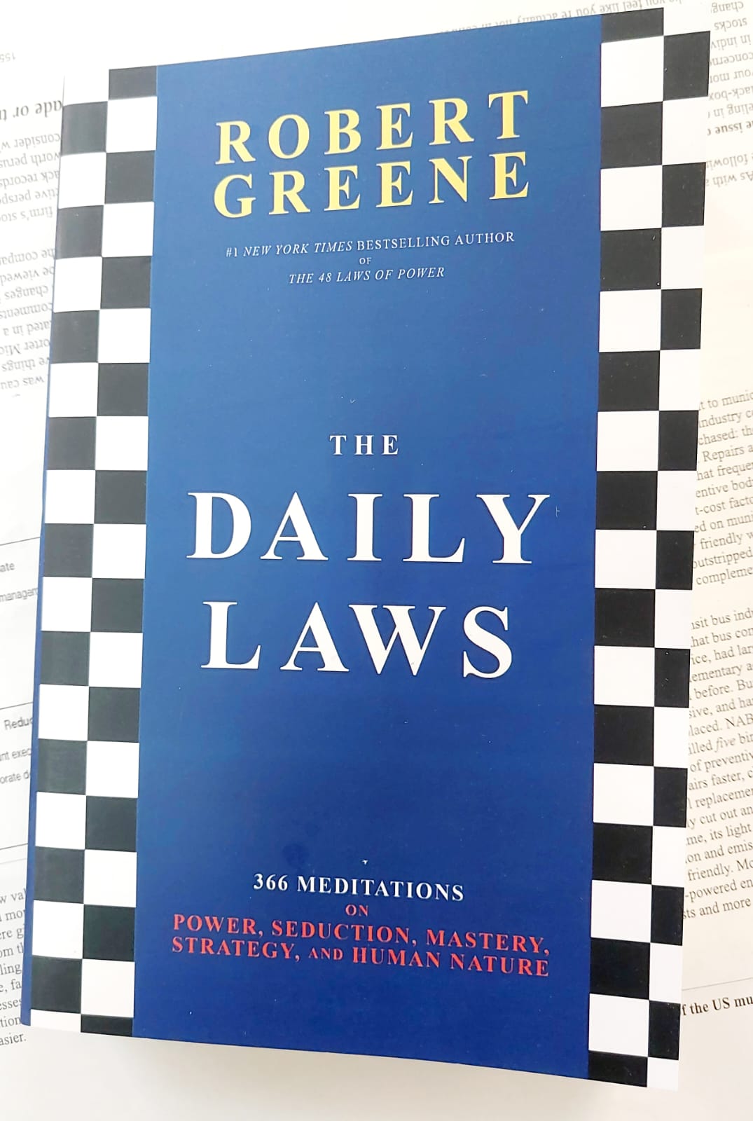 Picture of The Daily Laws: 366 Meditations on Power, Seduction, Mastery, Strategy, and Human Nature Book by Robert Greene - Premium - Paperback