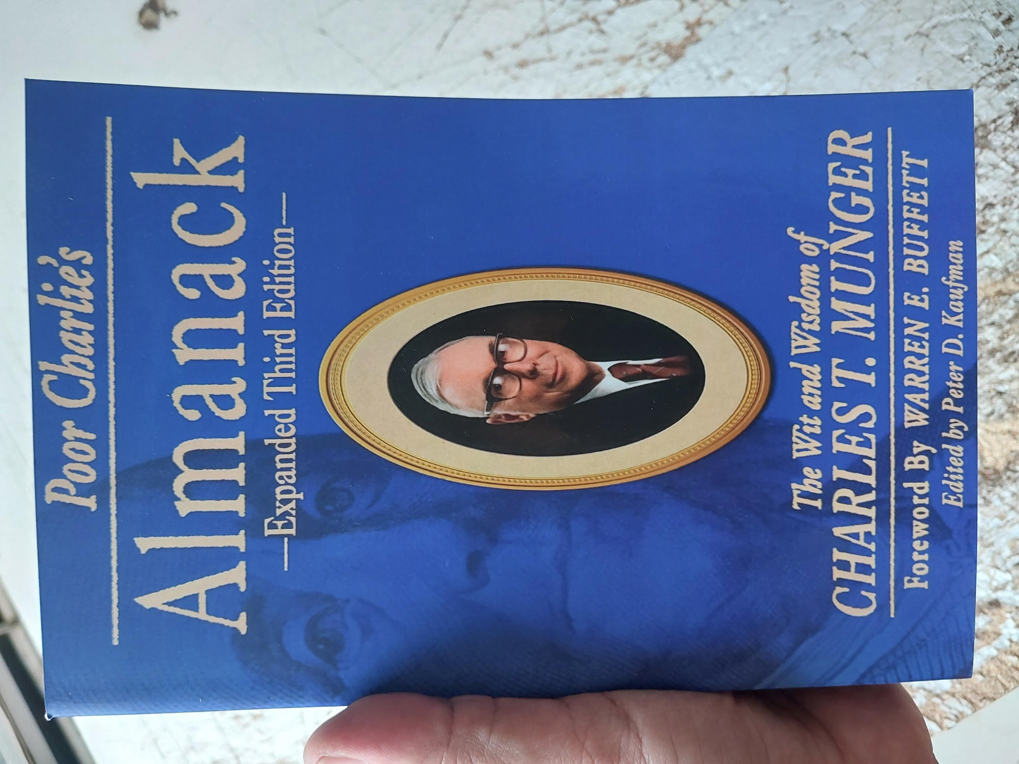 Picture of Poor Charlie's Almanack: The Wit and Wisdom of Charles T. Munger, Expanded Third Edition by Charlie Munger - Premium - Paperback