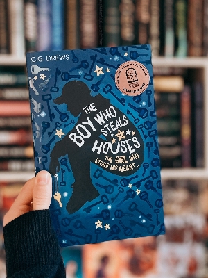 Picture of The Boy Who Steals Houses by C. G. Drews - Premium - Paperback