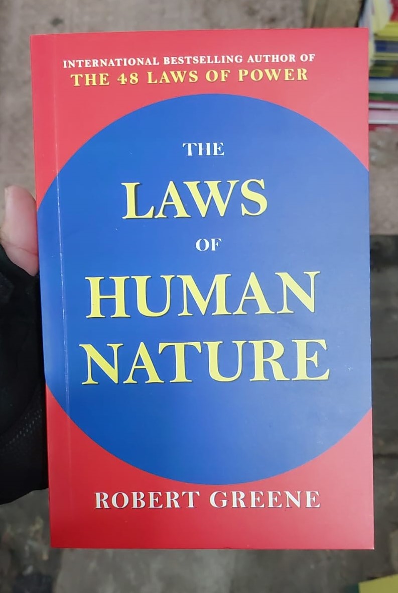 Picture of The Laws of Human Nature by Robert Greene - Yellow - Paperback