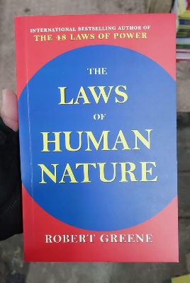 Picture of The Laws of Human Nature by Robert Greene - Yellow - Paperback