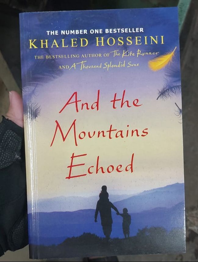 Picture of And the Mountains Echoed by Khaled Hosseini - Yellow - Paperback