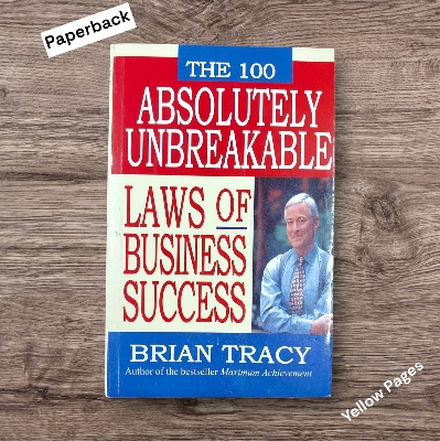 Picture of The 100 Absolutely Unbreakable Laws of Business Success by Brian Tracy - Yellow - Paperback
