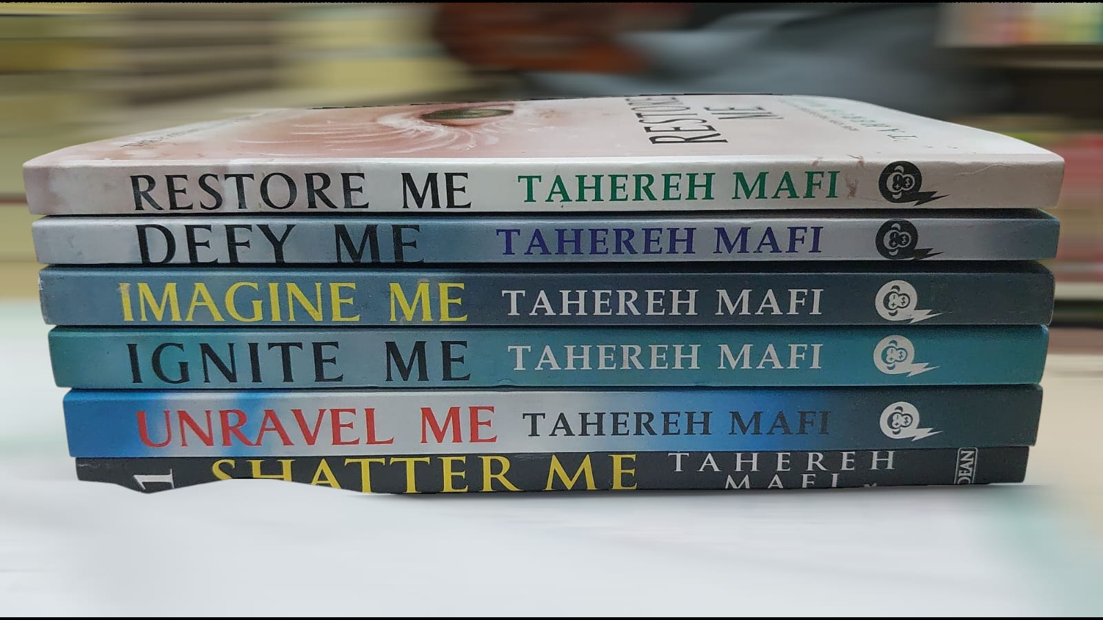 Picture of Shatter Me Series 6-Book Set: Shatter Me, Unravel Me, Ignite Me, Restore Me, Defy Me, Imagine Me by Tahereh Mafi  - Yellow - Paperback
