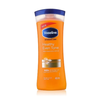 Picture of Any season used International South African Product Vaseline Lotion healthy even tone yellow color for male / female - 400 ml