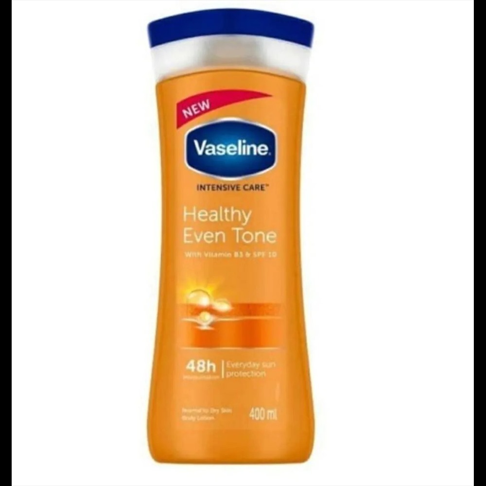 Picture of Any season used International South African Product Vaseline Lotion healthy even tone yellow color for male / female - 400 ml