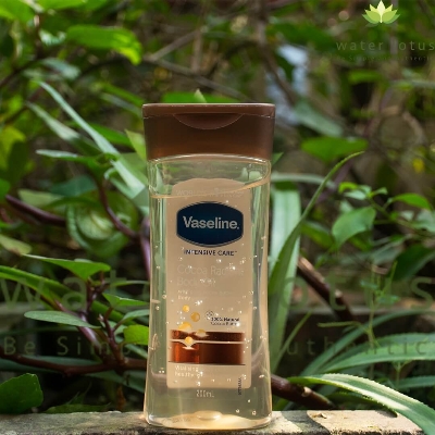 Picture of 200 ml Vaseline intensive care cocoa radiant body oil International UAE product used for male female