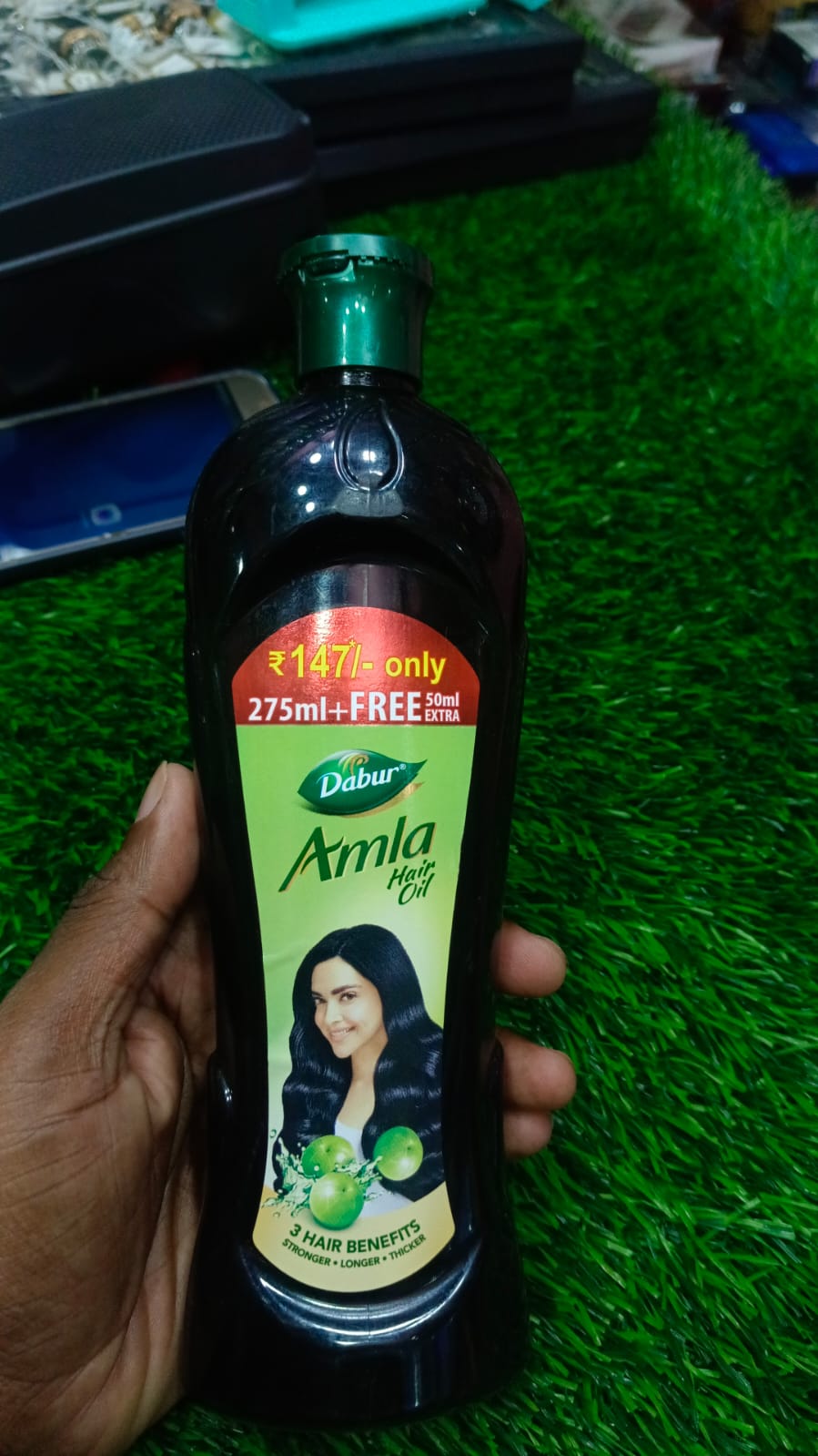 Picture of 325 ml Dabur amla hair oil Indian product used for male female