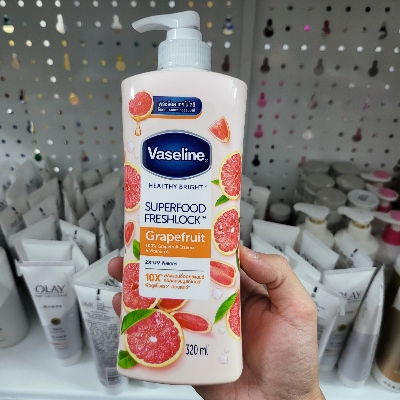Picture of 320 ml Vaseline Superfood Freshlook Grapefruit lotion International Thailand product used for male female