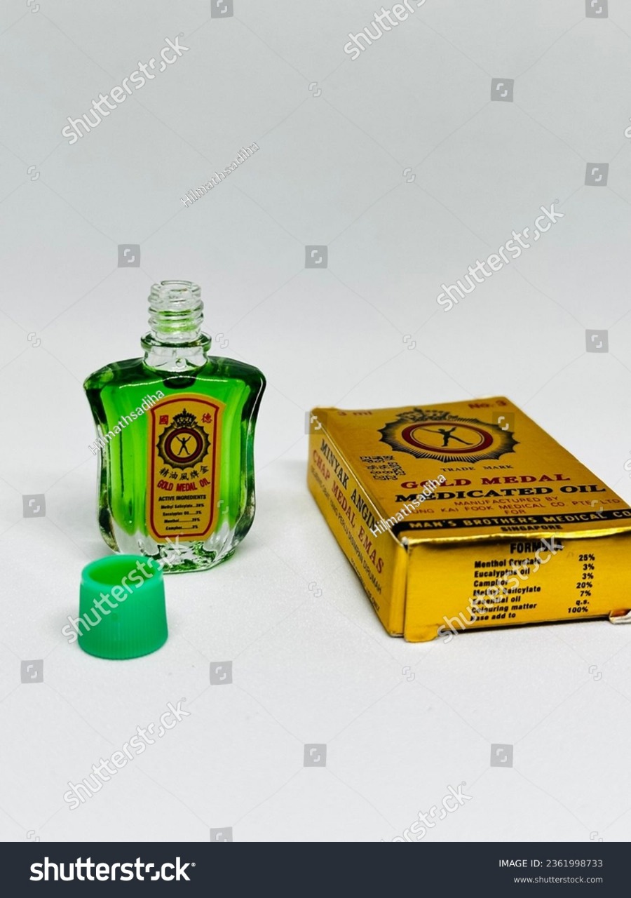 Picture of 10 ml International Singapore Product Gold Medal Medicated Oil for male/ female