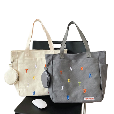 Picture of TAG Lifestyle Exclusive Design embroidery Canvas Tote Bag, Fashionable Top Handle Off White Color With 4 Outside Pockets Trendy Fashionable Tote Bag for University, College Students Girls And Women