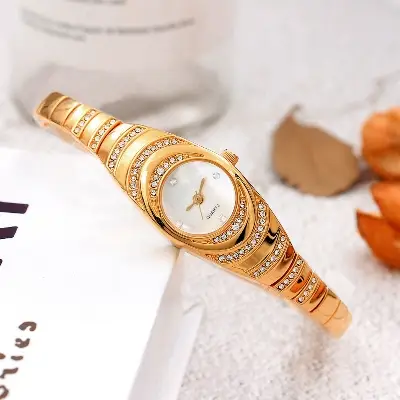 Picture of New Ripple Diamond Watch Women's Bracelet Women's Watch Fritillaria Face Bracelet Women's Watch - Watch For Women -  Watch - Golden Stainless steel Watch For women.