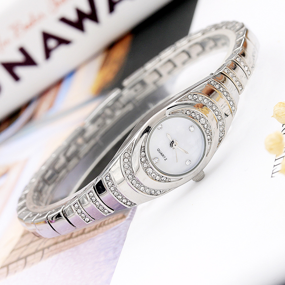 Picture of New Ripple Diamond Watch Women's Bracelet Women's Watch Fritillaria Face Bracelet Women's Watch - Watch For Women -  Watch - Golden Stainless steel Watch For women.