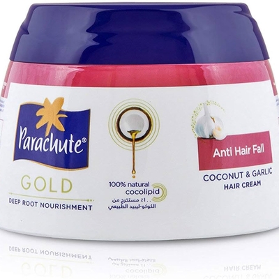 Picture of International UAE product Parachut Gold Anti Hair fall Hair cream used for male/ female 1 Piece- 140 ml