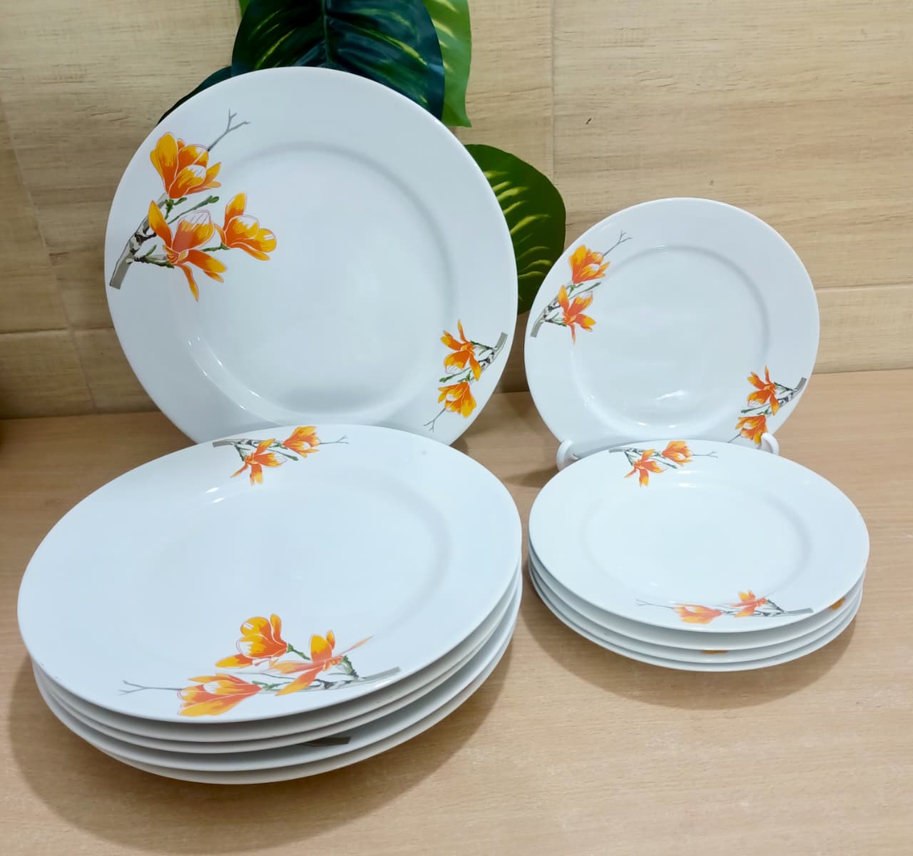 Picture of 32 piece  white orange ceramic dinner set premium quality dinner set