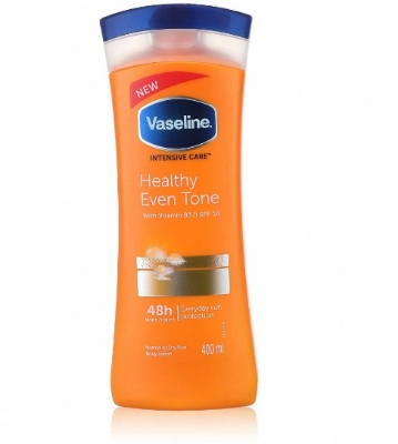 Picture of Any season used International South African Product Vaseline Lotion healthy even tone yellow color for male / female - 400 ml