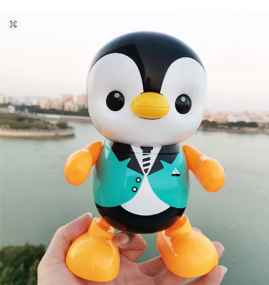 Picture of Dancing Penguin Toy Robot with Lightning Swinging Arms in Suit and Music for Kids