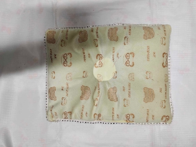 Picture of  Mustard pillow for newborns baby with velvet material covers