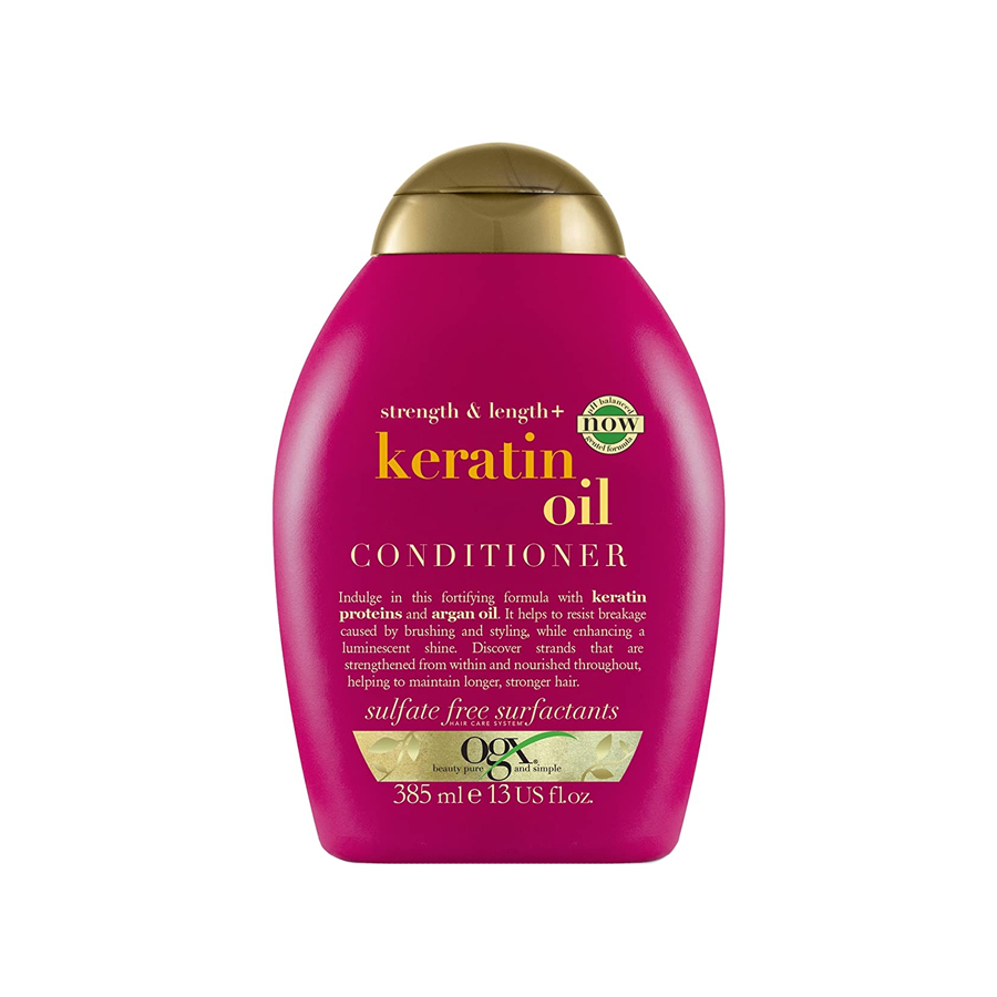 Picture of 385 ml OGX strength & lenth + keratin oil conditioner International Germany product used for male/ female