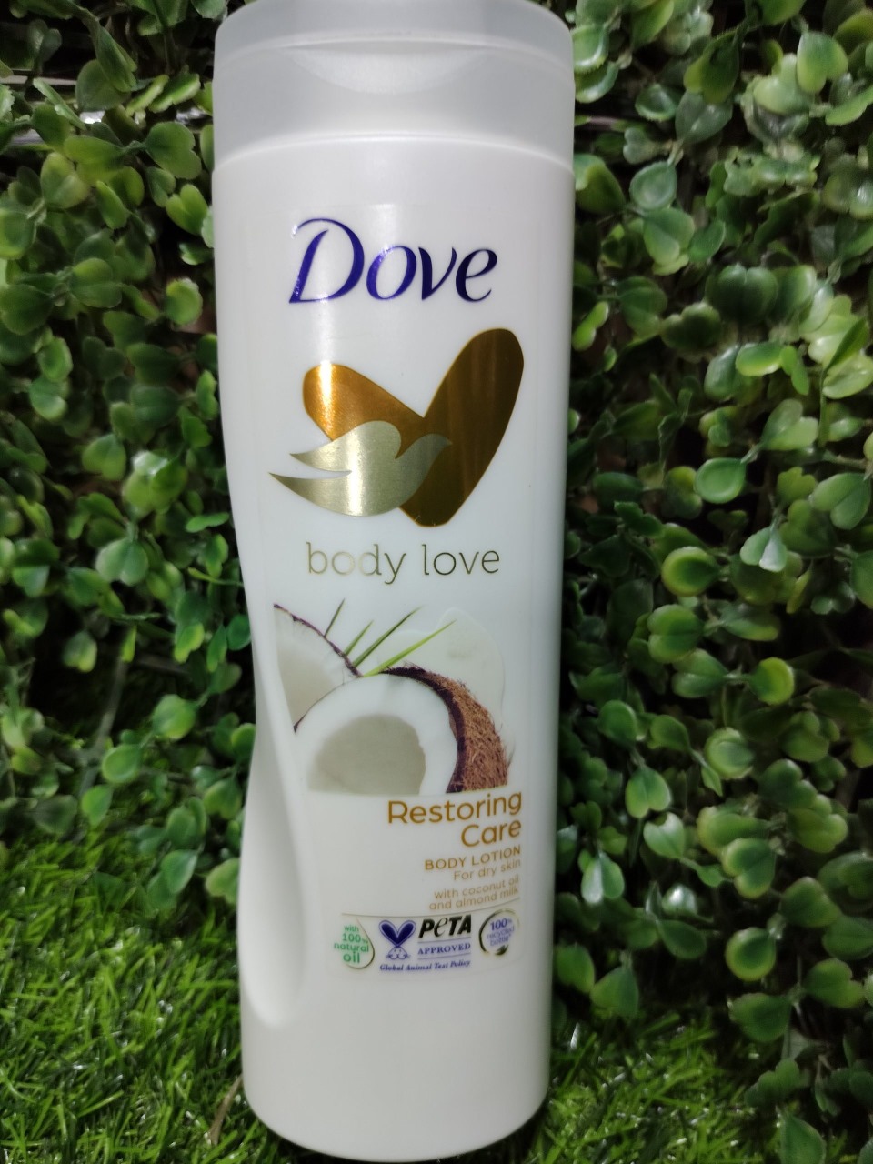 Picture of 400 ml Dove body love Restoring care Body Lotion International UK product used for male/ female
