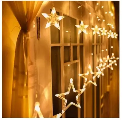 Picture of badge Golden Big Star Curtain Light, 12 Hanging Golden Star String Lights, Fairy Lights