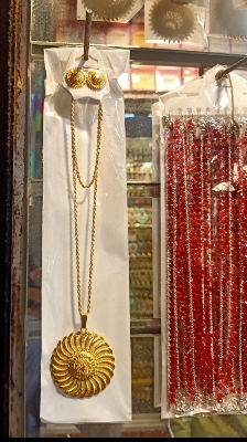 Picture of Gold plated locket chain with ear ring for women