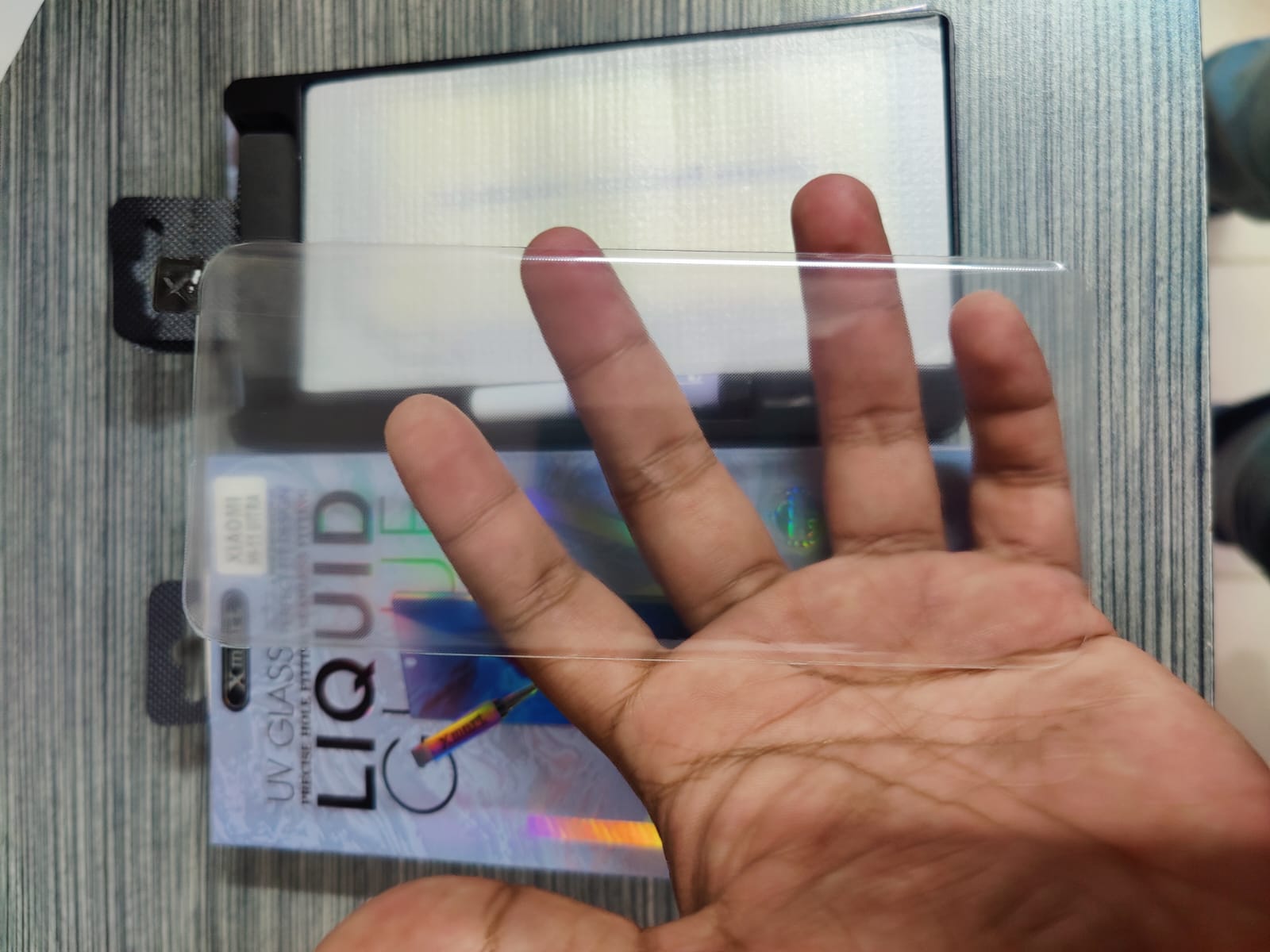 Picture of UV Light Adhesive Tempered Glass Screen Protector for Xiaomi MI 11/ 11 Pro/ 11 Ultra/ 12/ 12 Pro/ 12 Pro Transparent