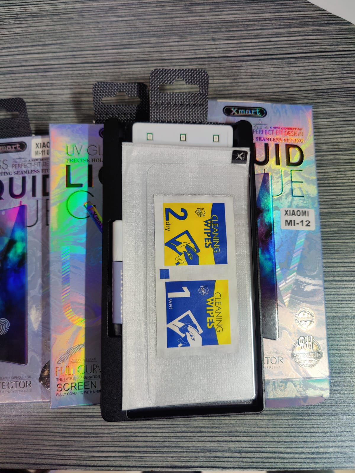 Picture of UV Light Adhesive Tempered Glass Screen Protector for Xiaomi MI 11/ 11 Pro/ 11 Ultra/ 12/ 12 Pro/ 12 Pro Transparent