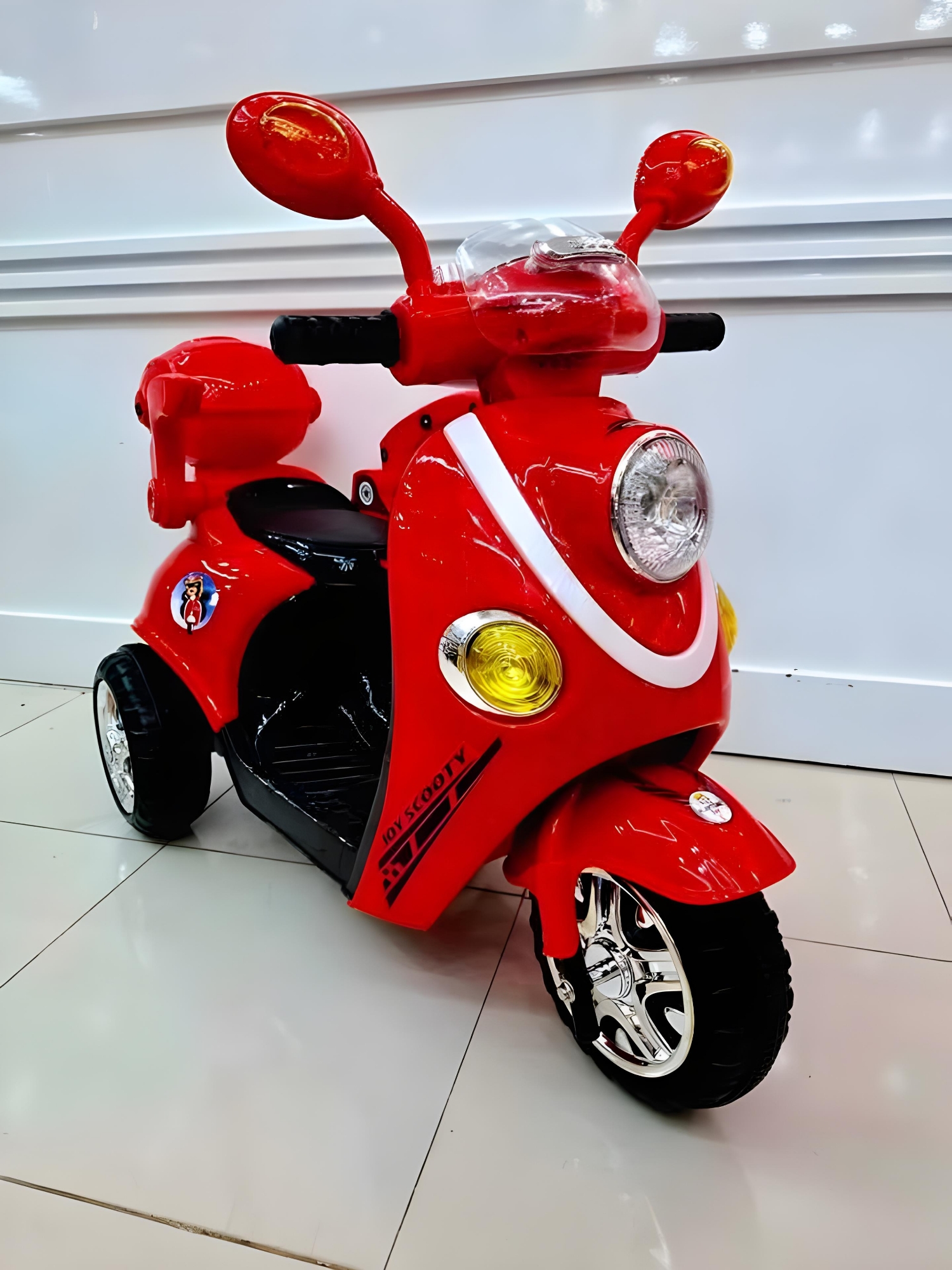 Picture of Kids Rechargeable Scooty Electric Bike with Key Start, Hand Pickup, Foot Brake, Music & LED Lighting Wheels –12V Battery Powered & Double Motor Ride-On Motorcycle for Children Age 4–15 Years
