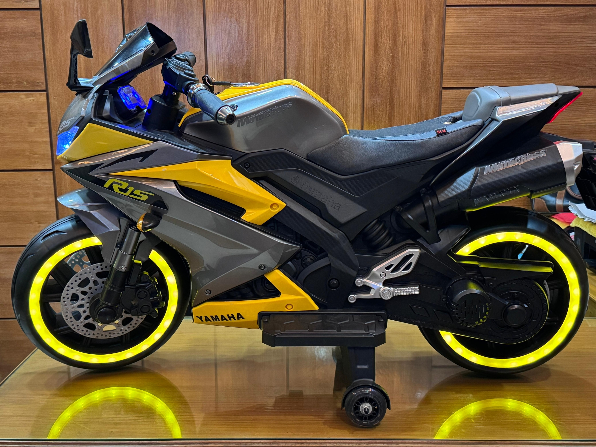 Picture of Kids Rechargeable R15 Electric Bike with Key Start, Hand Pickup, Foot Brake, Music & LED Lighting Wheels –12V Battery Powered & Double Motor Ride-On Motorcycle for Children Age 4–15 Years