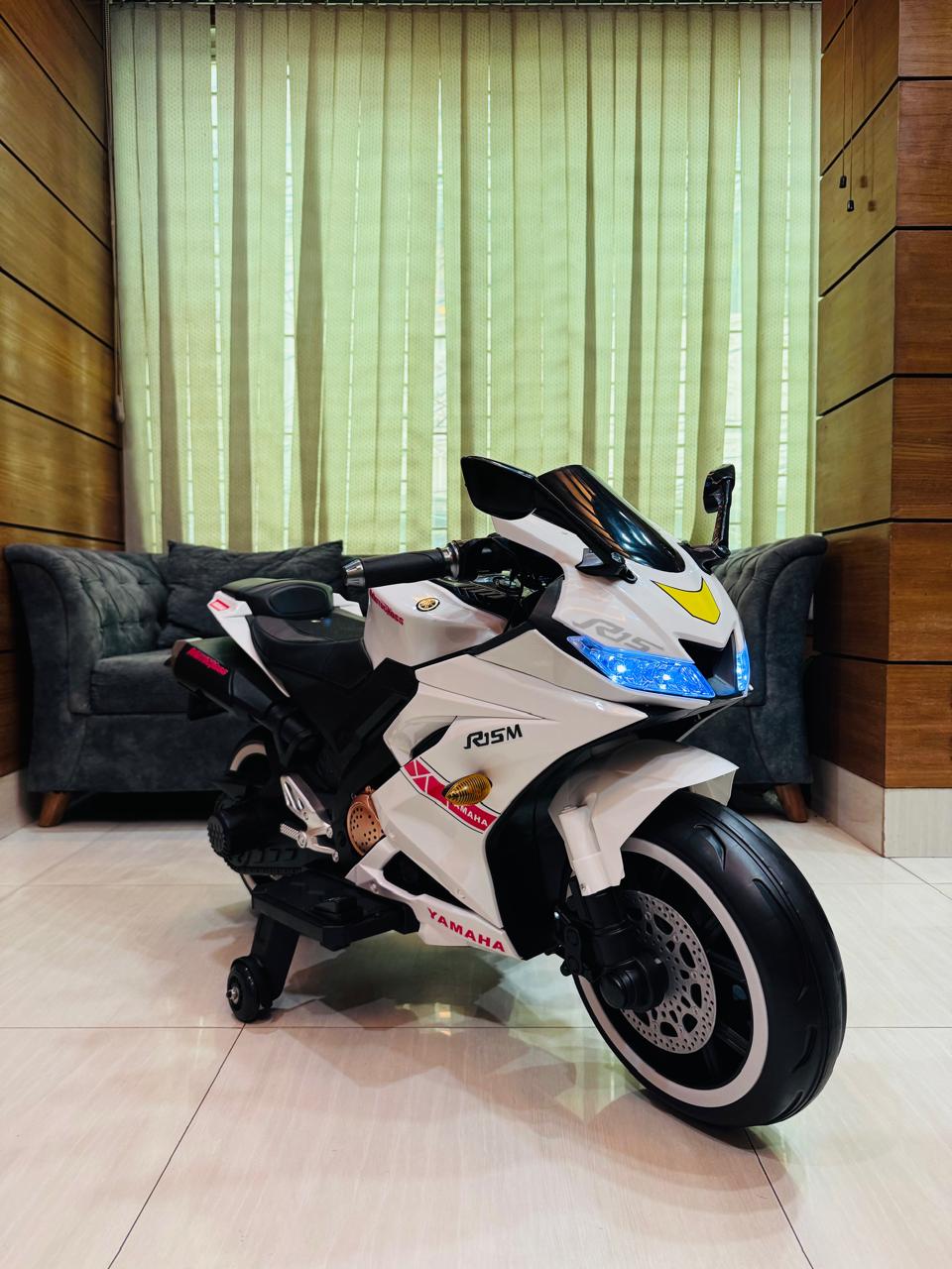 Picture of Kids Rechargeable R15 Electric Bike with Key Start, Hand Pickup, Foot Brake, Music & LED Lighting Wheels –12V Battery Powered & Double Motor Ride-On Motorcycle for Children Age 4–15 Years