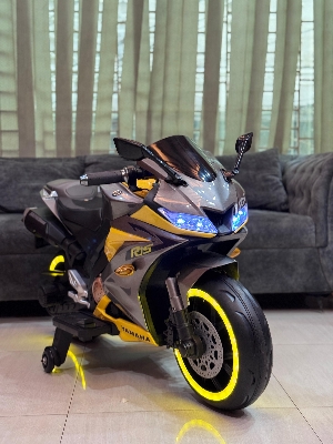 Picture of Kids Rechargeable R15 Electric Bike with Key Start, Hand Pickup, Foot Brake, Music & LED Lighting Wheels –12V Battery Powered & Double Motor Ride-On Motorcycle for Children Age 4–15 Years