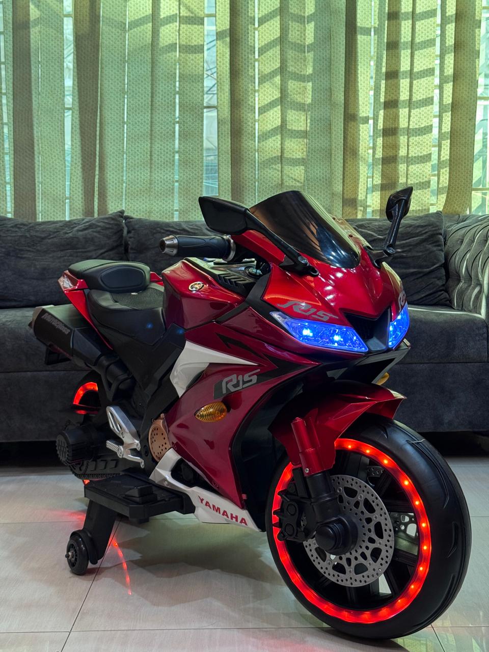 Picture of Kids Rechargeable R15 Electric Bike with Key Start, Hand Pickup, Foot Brake, Music & LED Lighting Wheels –12V Battery Powered & Double Motor Ride-On Motorcycle for Children Age 4–15 Years