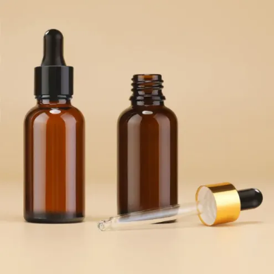 Picture of 500 Piece Combo , 50ml Premium Amber Glass Dropper Bottle with Golden Cap – Refillable, Leak-Proof & Eco-Friendly