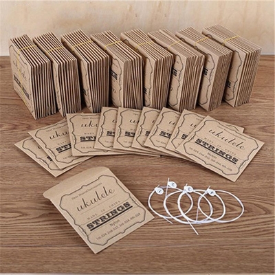 Picture of Nylon Ukulele Strings with Felt Ukulele Picks for Soprano (21 Inch)/ Concert (23 Inch)/ Tenor (26 Inch) Ukulele