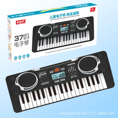Picture of piano toy musical instrument boys and girls