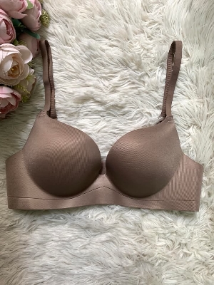 Picture of Women Gathered Seamless Lingerie Solid Small Breast Wireless Push Up Bra One Piece Thickened Comfortable Anti Sagging Invisible

C