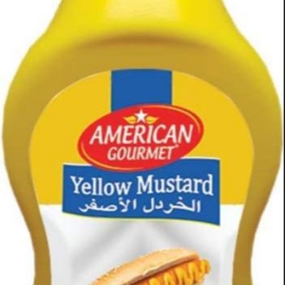 Picture of American Gourmet Yellow Mustard 08 oz. Classic yellow mustard with a bold and tangy flavor. Versatile condiment perfect for sandwiches hot dogs and barbecue dishes.