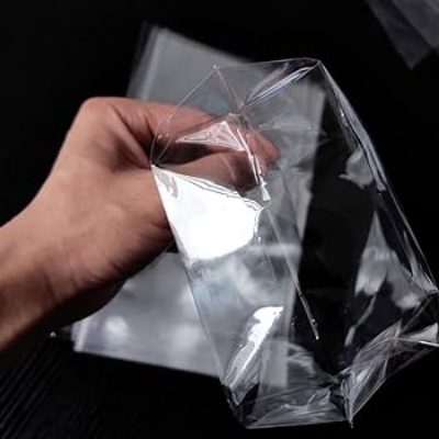 Picture of (9" x 16") 50 pcs crystal cellophane poly bag for packaging material with adhesive