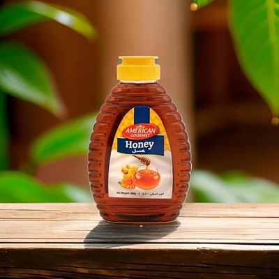 Picture of American Gourmet Honey (500g). Made in Australia from 100% Pure Honey. Crafted to be pure and natural delivering the authentic and rich flavor of honey.