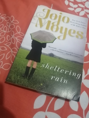 Picture of Sheltering Rain by Jojo Moyes ( Premium Paper and Matte Cover ) Novel